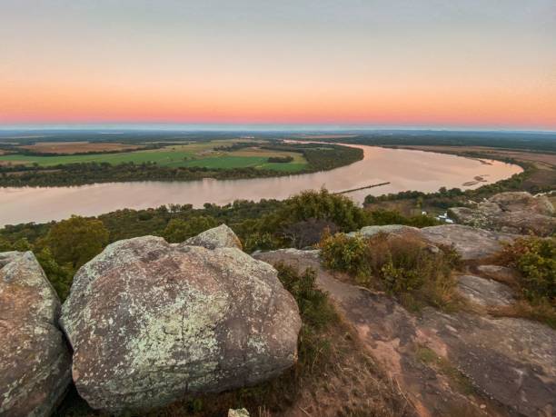 istock Scenic view of a curved river st sunset 1453927057