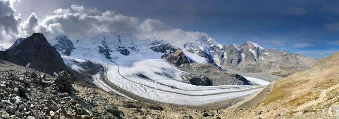 Diavolezza mountain cable car station panorama of the surrounding mountain range and glacier on a sunny blue sky autumn day