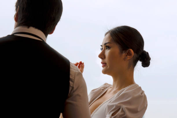 Upper class man and woman are working at luxury room. City view at high building. Working and luxury concept.