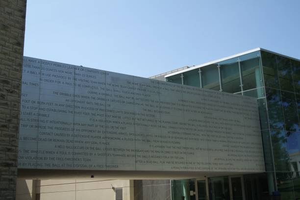 Original rules of basketball engraved on a gray overpassing walkway at the DeBruce Center in Kansas Lawrence Kansas, United States – August 02, 2022: The original rules of basketball engraved on a gray overpassing walkway at the DeBruce Center in the University of Kansas kansas basketball stock pictures, royalty-free photos & images