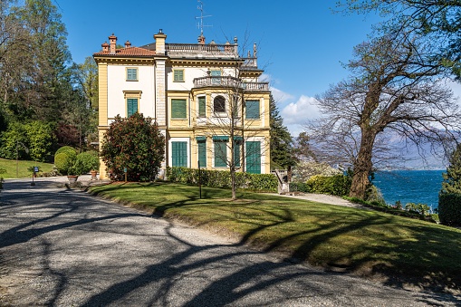 Stresa, Italy – April 16, 2022: The Villa Pallavicino in Stresa with a beautiful park overlooking Lake Maggiore in Piedmont, Italy