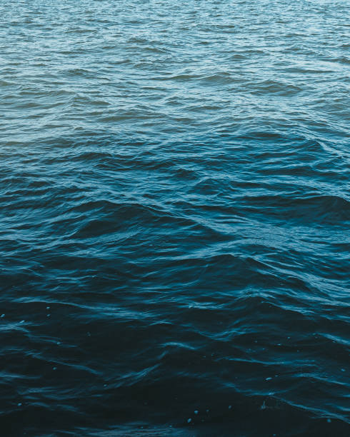 istock Vertical close-up shot of the wavy sea.Great for a pattern. 1453934889