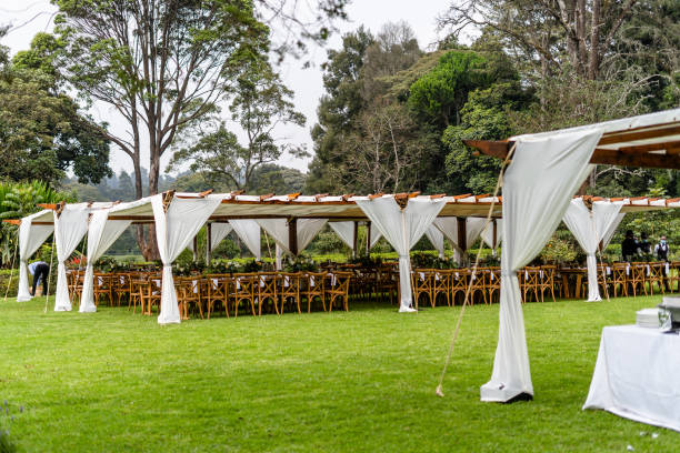istock Outdoor wedding ceremony venue with arranged chairs 1453934917