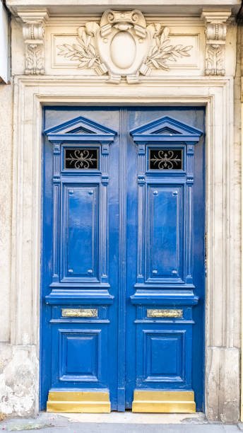 istock Paris, a wooden door 1453937928