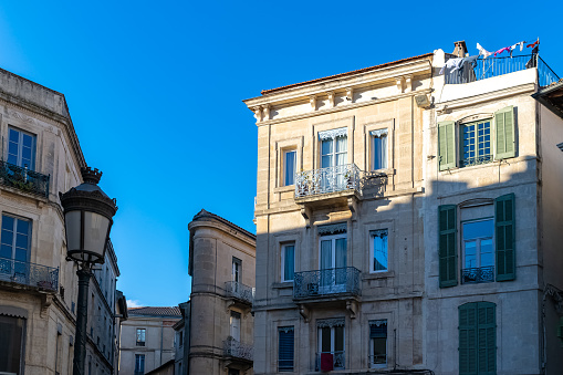 Nimes in Franc, old facades in the historic center, typical buildings