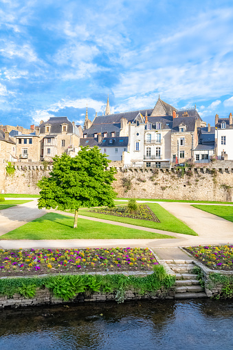 Vannes, old houses in the ramparts garden, with the cathedral in background