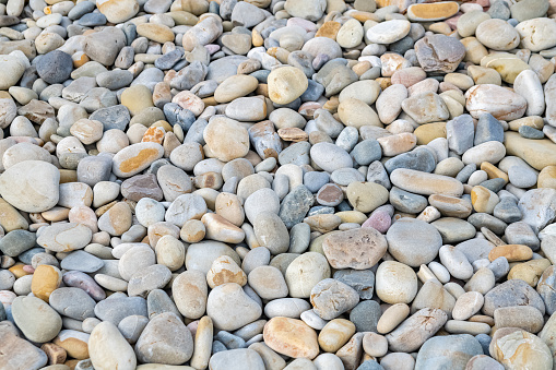 Pebble beach on the beach, colorful background