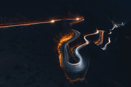 Night scene Todra Gorge steep winding mountain road  Dades Valley Morocco