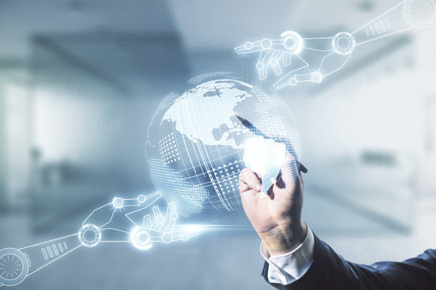 istock Double exposure of male hand with pen draws abstract virtual robotics technology with world map hologram on blurred office background. Research and development software concept 1453943837