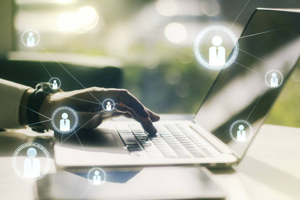 istock Double exposure of social network icons concept with hand typing on computer keyboard on background. Networking concept 1453944093