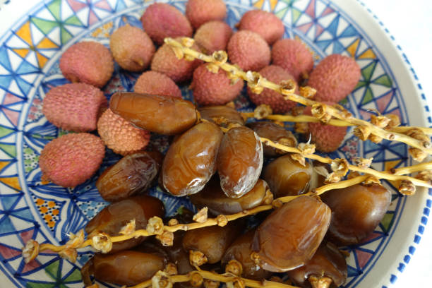istock Branch dates and ripe lychees  Dessert buffet 1453944169