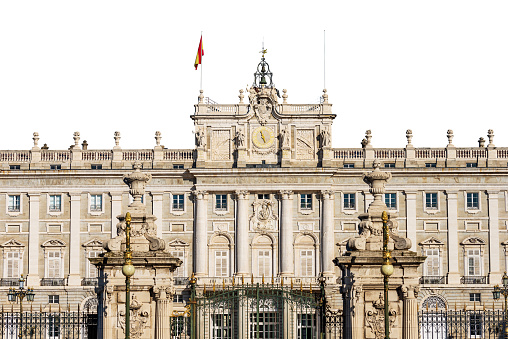 Madrid Royal Palace in Baroque style isolated on white background. In the past used as the residence of the King of Spain, Plaza de la Armeria, Community of Madrid, Spain, southern Europe.