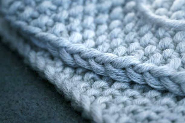 istock Knitted item made of light gray merino wool 1453947202