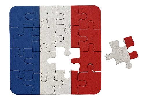 French flag printed on a jigsaw puzzle, with one piece not yet placed, representing a problem to be solved.