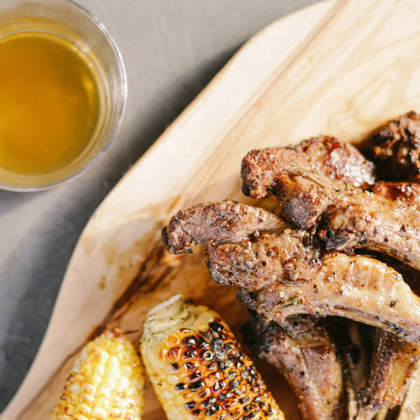 istock Closeup shot of grilled maize and meat 1453947629