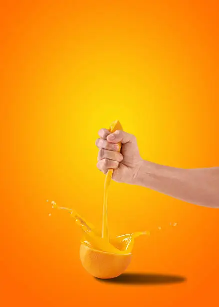 Photo of Conceptual image of freshly squeezed orange