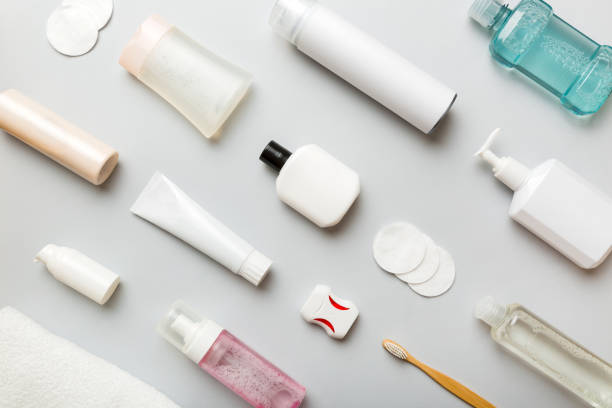 istock Mockup for bathing products top view flat lay, spa razor, toothpaste, soap, gel and other various accessories. Cosmetics for skin health. Bath Mockup for your logo 1453949806