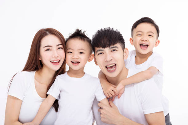istock Happy Asian family isolated on white background 1453949980
