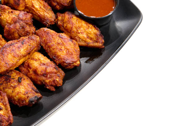 istock plate with barbecue chicken wings 1453951710