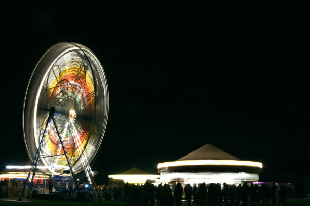istock Enigmatic fun fair in the dark 1453953100