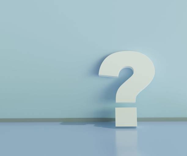 istock Question mark on the blue wall on the floor 1453953376