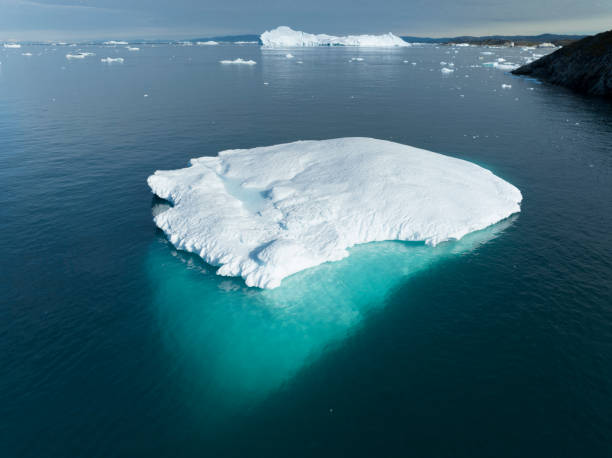 istock big icebergs floating over sea from aerial view 1453959640