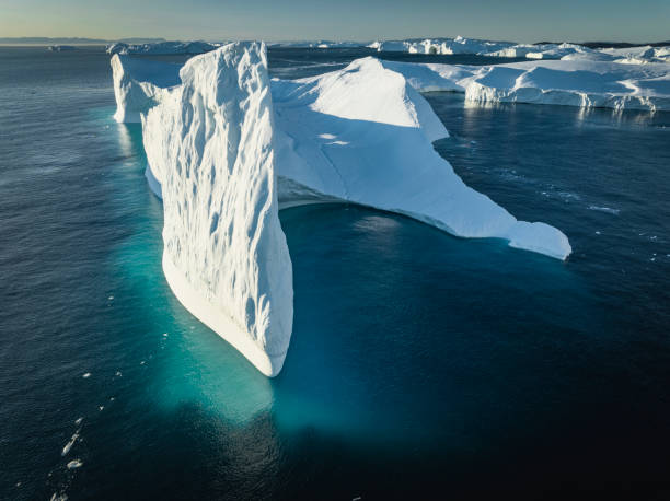istock big icebergs floating over sea from aerial view 1453959697