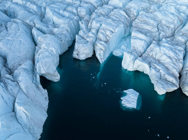 istock big icebergs floating over sea from aerial view 1453959780