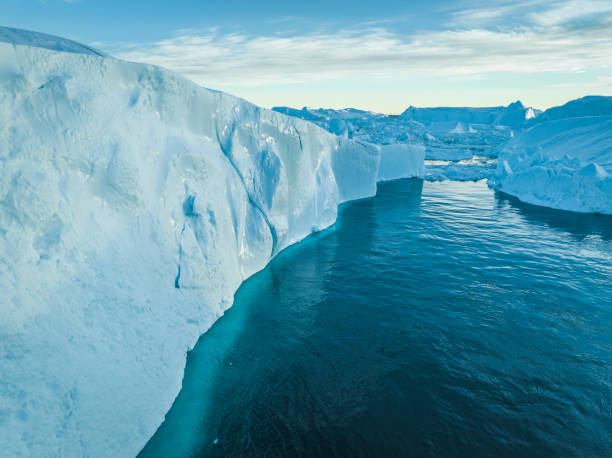 istock big icebergs floating over sea from aerial view 1453959788