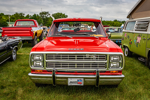 Iola, WI - July 07, 2022: High perspective front view of a 1979 Dodge Lil Red Express Pickup Truck at a local car show.