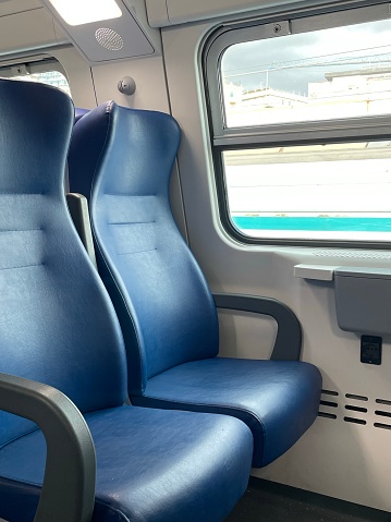 Rows of seats in empty train stock photo