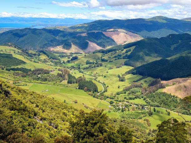 istock Scenic shot of mountain fields and valleys under a cloudy sky 1453964439