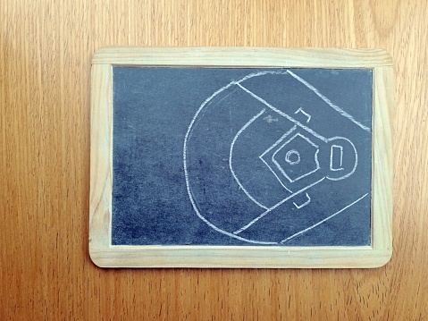Baseball Field Illustration On Chalkboard, Wooden Table Background
