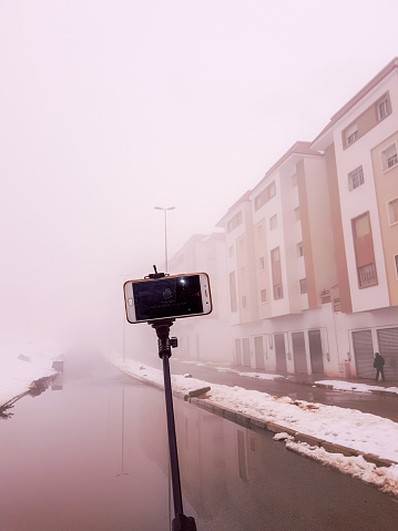 A selfie stick in a deep cloud