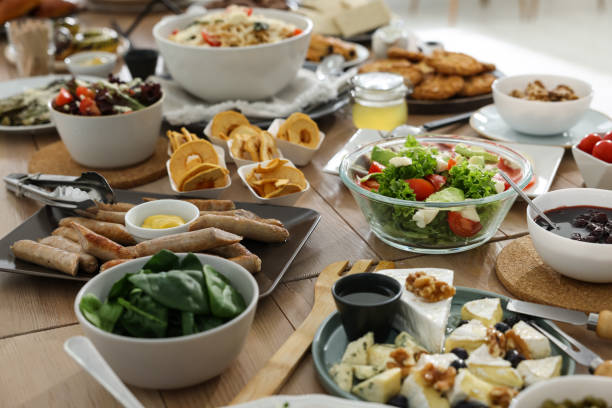 istock Brunch table setting with different delicious food indoors 1453970395