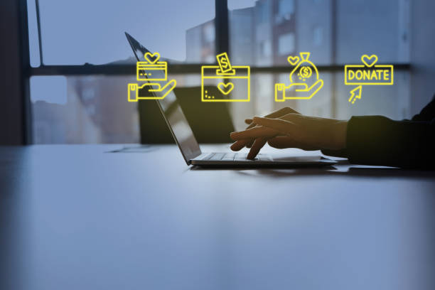 istock Donate icons on laptop 1453972405