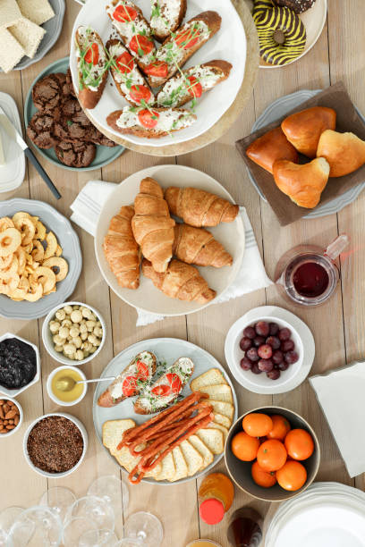 istock Brunch table setting with different delicious food, flat lay 1453972769