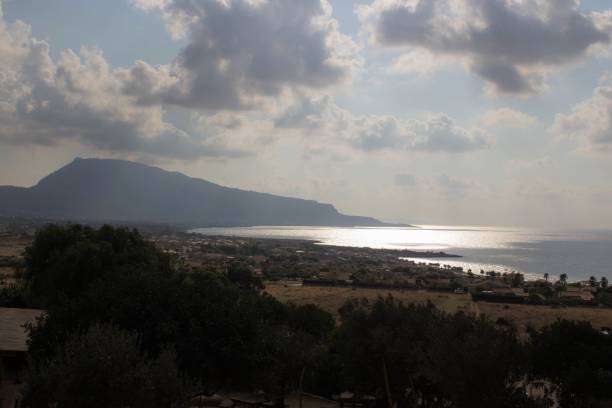istock maritime coast with promontory on the background in Sicily, Italy 1453972899