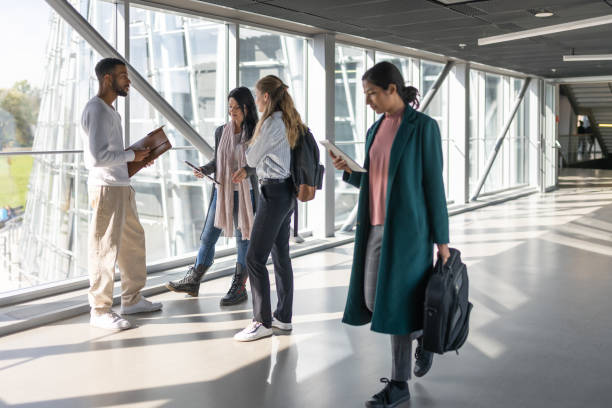istock Students are talking on the stairs of the university. 1453972959