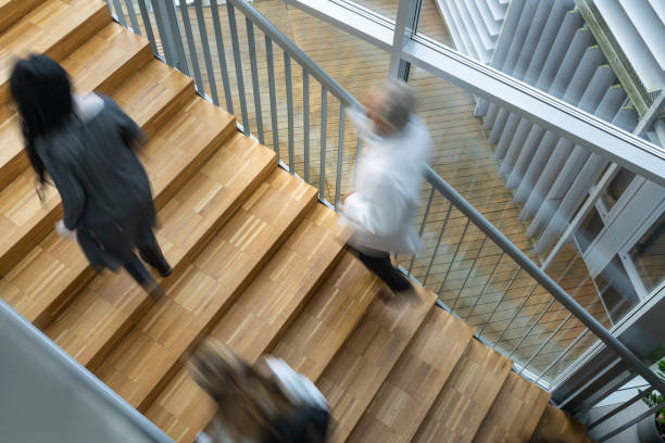istock Students are talking on the stairs of the university. 1453973013