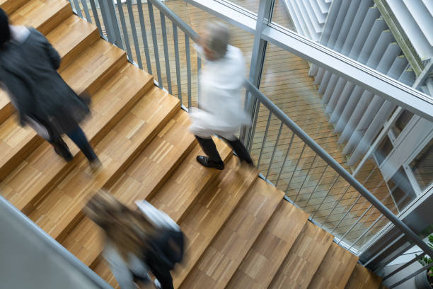 istock Students are talking on the stairs of the university. 1453973015