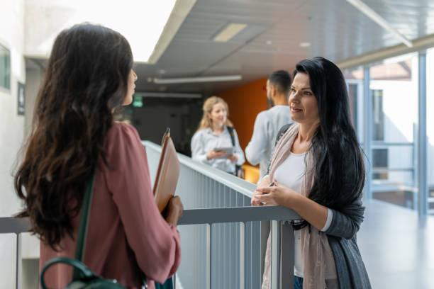 istock Students are talking on the stairs of the university. 1453973033