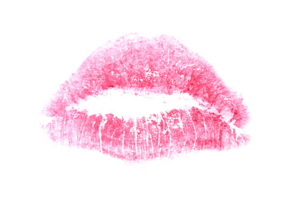 istock Pink lipstick kiss mark isolated on white 1453974394