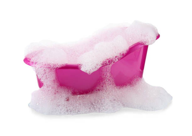 istock Pink toy bathtub with foam isolated on white 1453975214