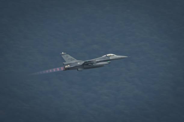 Silhouette image of a fighter jet
