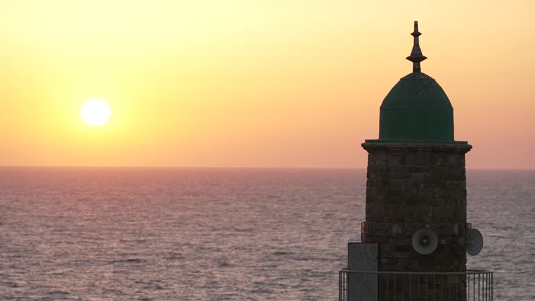 A Mosque tower at sunset