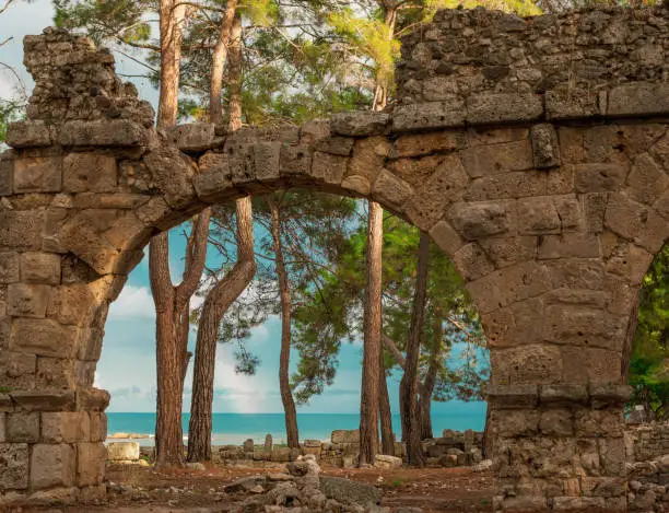 Ruins of aquaeduct in ancient city Phaselis, Antalya Province, Turkey. Lycian ancient civilization heritage