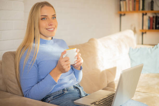istock Young woman working from home 1453982153