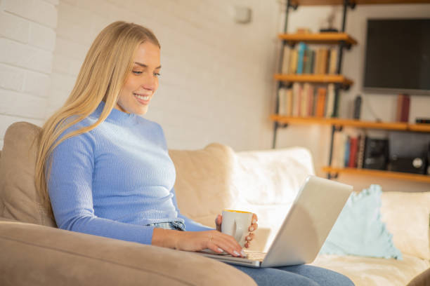 istock Young woman working from home 1453982165