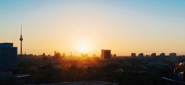Aerial cityscape view into the morning sun